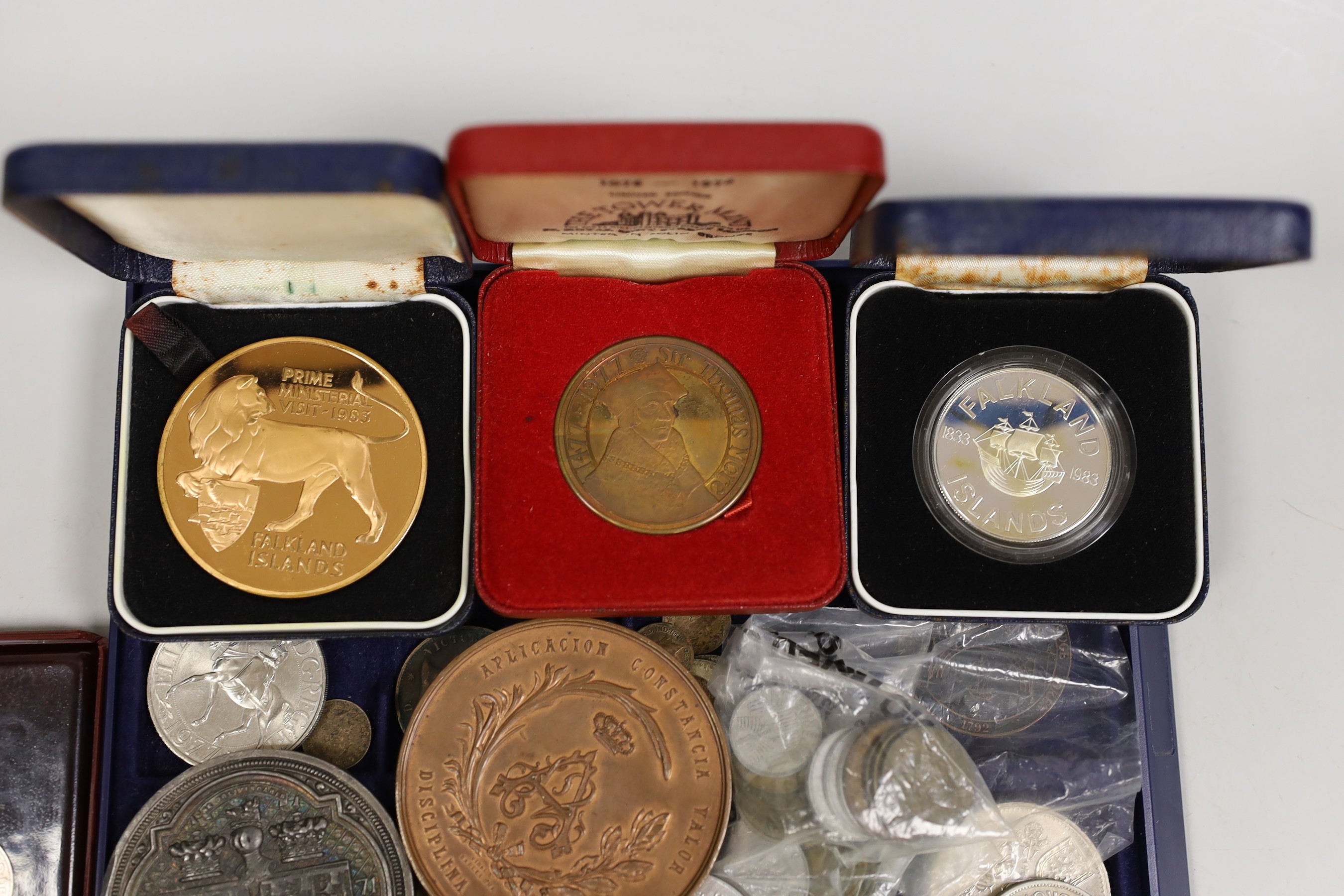 A Princess Louise marriage medal, a Barcelona 1878 valor bronze medal, two Falklands medals (one silver) and a Tower of London medal, and other various coins and medals